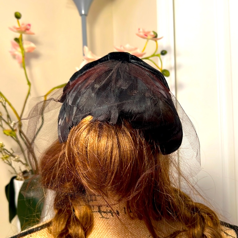Vintage black feathered hat with veil